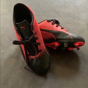 Youth soccer cleats.